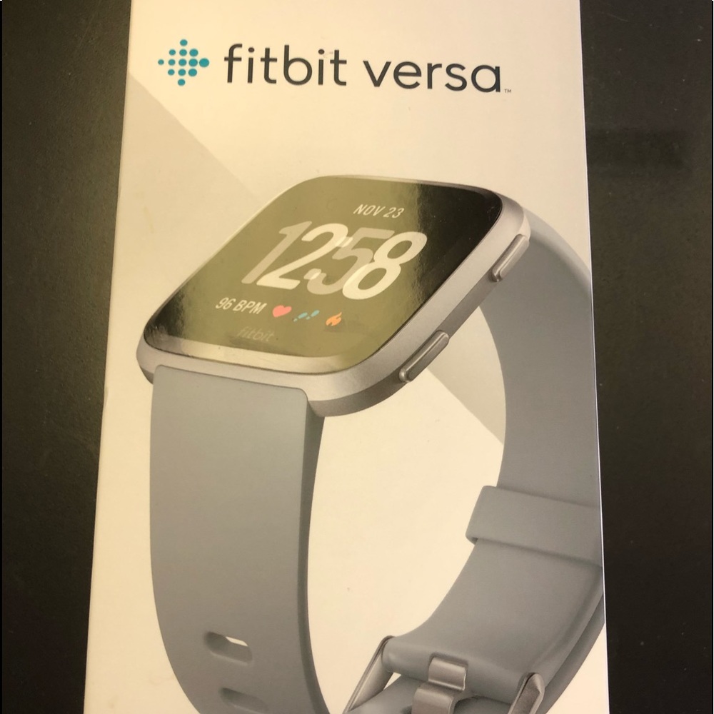 Fitbit Versa with three extra leather bands